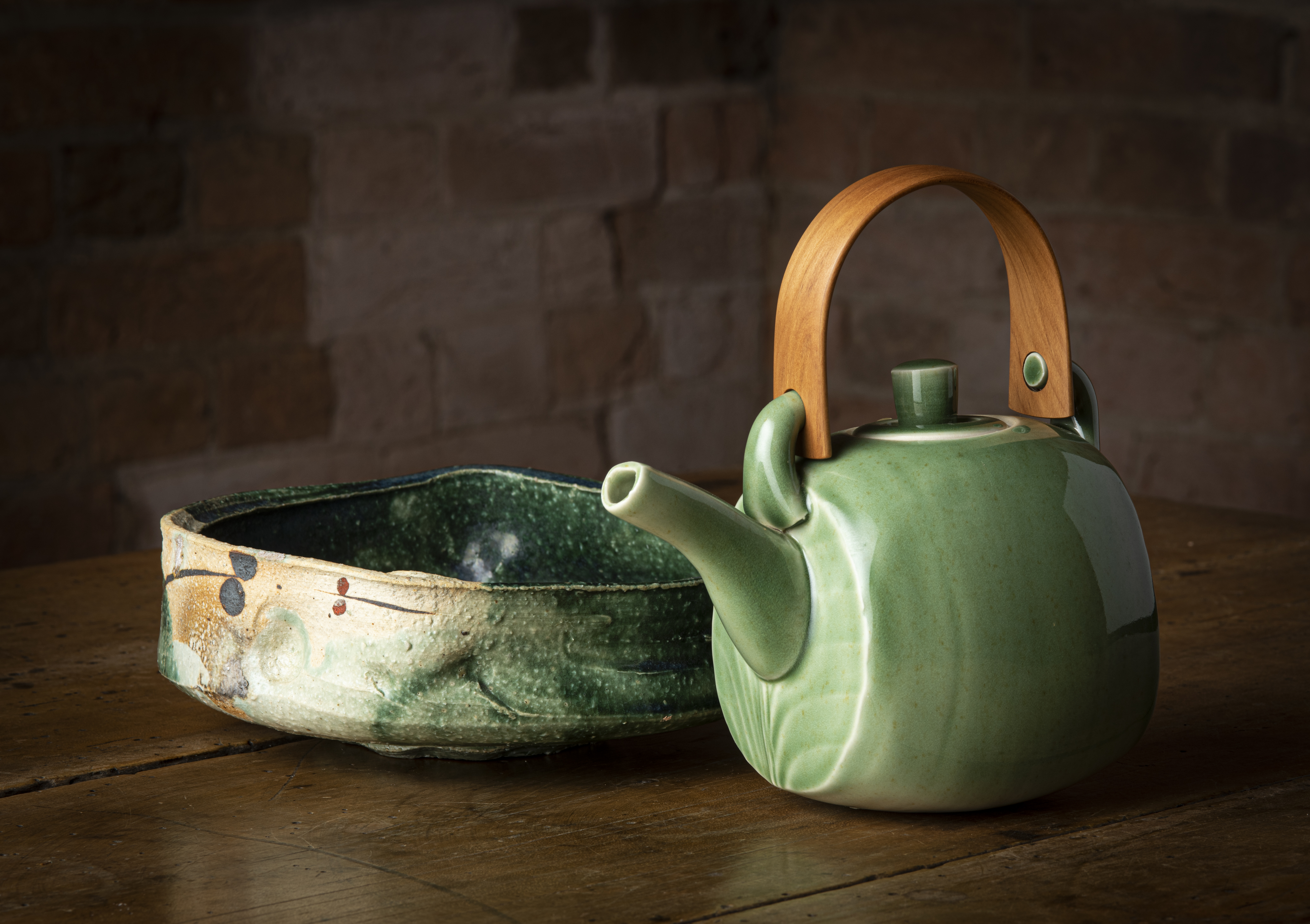 Paul Davis, Dish, stoneware, Oribe glaze, 2006; Chris Weaver, Teapot, porcelain, celadon glaze, 2010